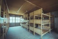 Dachau, Germany - July 30, 2015: Inside sleeping quarters with wooden bunk beds showing prisoners terrible living Royalty Free Stock Photo