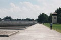 Dachau Germany JULY 2013 people visiting the Dachau Concentration Camp Memorial Site at the former Nazi concentration camp of Dach Royalty Free Stock Photo