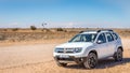 Dacia Duster in the Kalahari desert, Namibia. Royalty Free Stock Photo