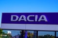 Dacia sign text and brand logo romania car dealership shop garage station