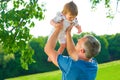 Dad with a baby outdoors. Royalty Free Stock Photo