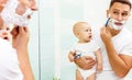 Dad and baby son shave