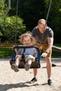 Dad with child on the playground Royalty Free Stock Photo