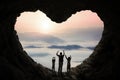 Dad and children inside cave shaped heart Royalty Free Stock Photo