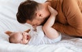Dad Cuddling Bonding With Cute Little Baby Son At Home Royalty Free Stock Photo