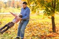 Dad and daughter in the autumn park play laughing Royalty Free Stock Photo