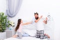 Dad and daughter child playing and fighting with pillows having fun together, happy family day Royalty Free Stock Photo