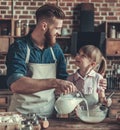 Dad and daughter cooking Royalty Free Stock Photo