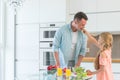 Dad and daughter cooking at home Royalty Free Stock Photo