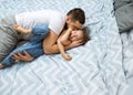 Dad and daughter have fun at home on the bed. Father`s Day Royalty Free Stock Photo