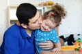 Dad and daughter having fun and playing at home. Royalty Free Stock Photo