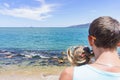 Dad and daughter playing on the promenade by the sea. young man, little girl Royalty Free Stock Photo