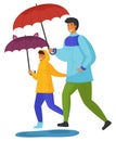 Dad and daughter are walking with umbrellas in rain. Autumn weather. Funny children s eared umbrella Royalty Free Stock Photo