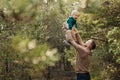Dad is fooling around with his son. Dad throws his son in the air.Father playing with his son. Happy child. Father`s day Royalty Free Stock Photo