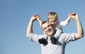 Dad giving his young son a piggy back ride Royalty Free Stock Photo