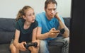 Dad and his daughter playing console game. Royalty Free Stock Photo