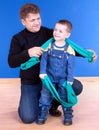 Dad and his young son playing and smiling Royalty Free Stock Photo