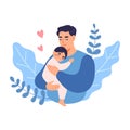 Dad hugging newborn baby