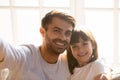 Dad and kid daughter with happy faces posing taking selfie Royalty Free Stock Photo