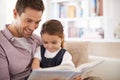 Dad, kid and reading book for storytelling, happy with bonding at home and knowledge for education. Man, young girl and Royalty Free Stock Photo