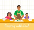 Dad with kids cooking dinner together in kitchen Royalty Free Stock Photo