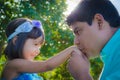 Dad kissing dauther hand Royalty Free Stock Photo