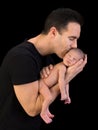 Dad kissing newborn son Royalty Free Stock Photo