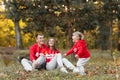 Dad, mom and little cute daughter having fun and playing in the autumn park. family concept, father`s, mother`s and baby`s day Royalty Free Stock Photo