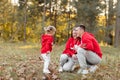 Dad, mom and little cute daughter having fun and playing in the autumn park. family concept, father`s, mother`s and baby`s day Royalty Free Stock Photo