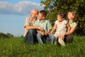 Dad, mom, son and daughter in early fall park Royalty Free Stock Photo