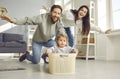 Dad, mom and toddler baby having fun playing at home Royalty Free Stock Photo
