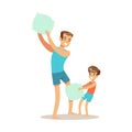 Dad Pillow Fighting With Son, Loving Father Enjoying Good Quality Daddy Time With Happy Kid Royalty Free Stock Photo