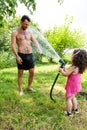 Dad play with little daughter outdoors Royalty Free Stock Photo