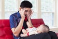 Dad play peekaboo with his baby Royalty Free Stock Photo