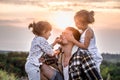 Dad playing with two little cute daughters Royalty Free Stock Photo
