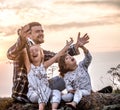 Dad playing with two little cute daughters Royalty Free Stock Photo