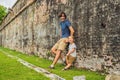 Dad and son on background of Fort Cornwallis in Georgetown, Pena Royalty Free Stock Photo