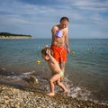 Dad and son on the beach Royalty Free Stock Photo