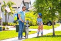 dad and son on biking adventure. Cycling duo. dad and son duo pedaling through picturesque landscape. supportive dad Royalty Free Stock Photo