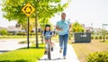 dad and son on biking adventure. dad and son duo pedaling through picturesque landscape. supportive dad guiding his son Royalty Free Stock Photo