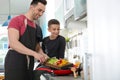 Dad and son cooking together Royalty Free Stock Photo
