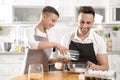 Dad and son cooking together Royalty Free Stock Photo