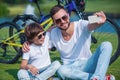 Dad and son cycling Royalty Free Stock Photo