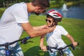 Dad and son cycling Royalty Free Stock Photo