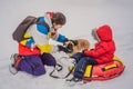 Dad and son have fun on tubing in the winter. Winter fun for the whole family Royalty Free Stock Photo