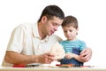 Dad and son kid teach building nesting box Royalty Free Stock Photo