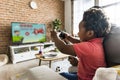 Dad and son playing game at living room together Royalty Free Stock Photo