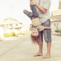 Dad and son playing near a house Royalty Free Stock Photo