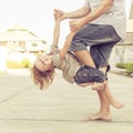 Dad and son playing near a house Royalty Free Stock Photo