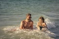 dad and son playing together. happy moments with father and son. Father son beach adventure playing with toy ship Royalty Free Stock Photo